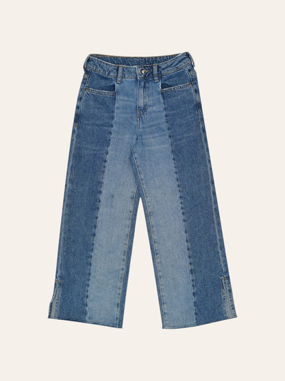 Cut and Sew Flared Denim Jeans
